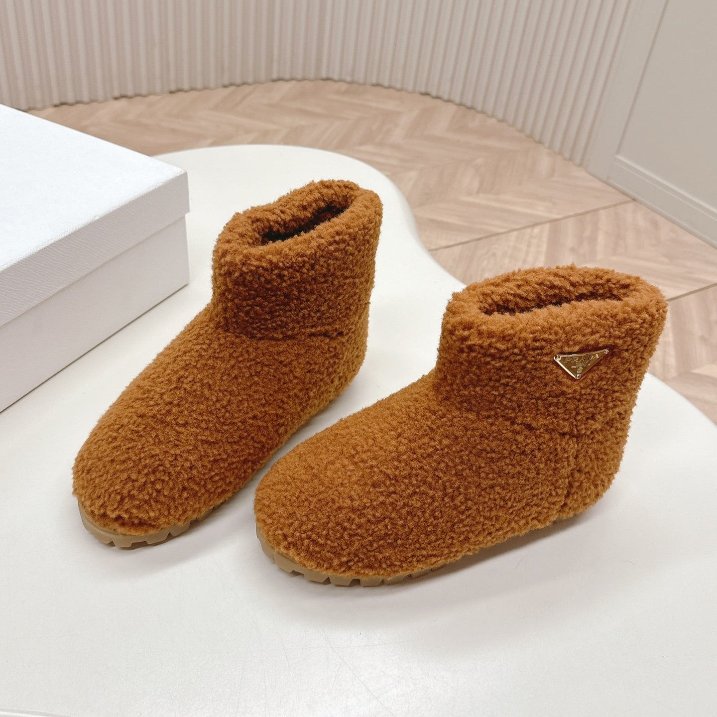 Luxury PradaSNOW ANKLE BOOTS IN BRONZE BROWN SHEARLING