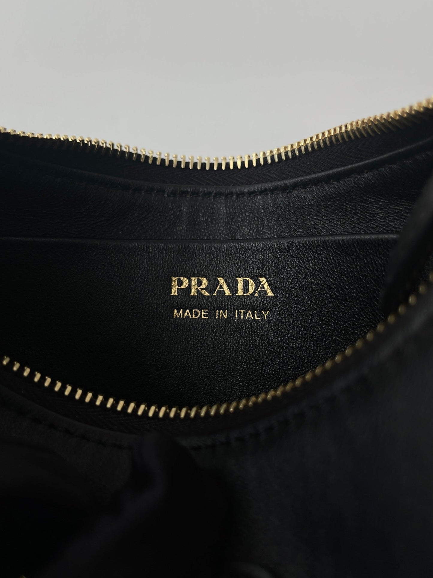 Luxury PradaARQUÉ 22 SHOULDER BAG IN BLACK LEATHER