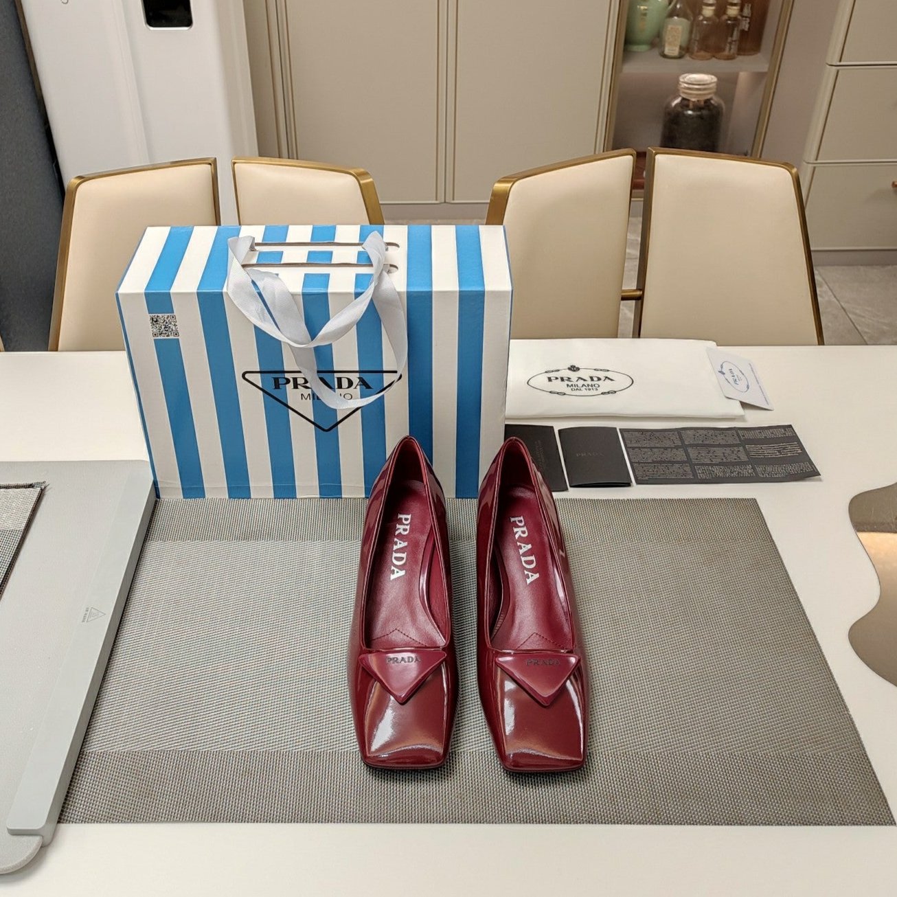 Luxury PradaTRIANGLE LOGO PUMPS IN CURRANT RED GLOSSY CALFSKIN