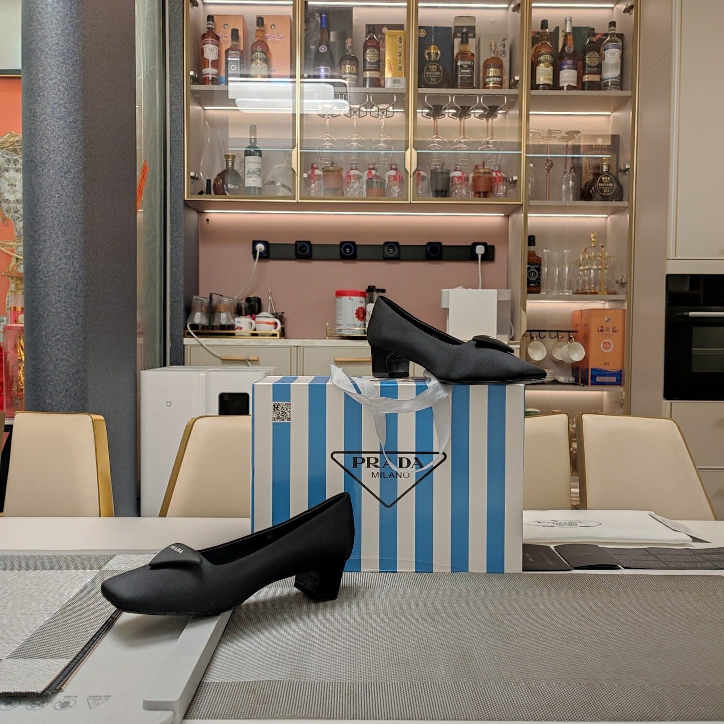 Luxury PradaTRIANGLE LOGO PUMPS IN BLACK SATIN