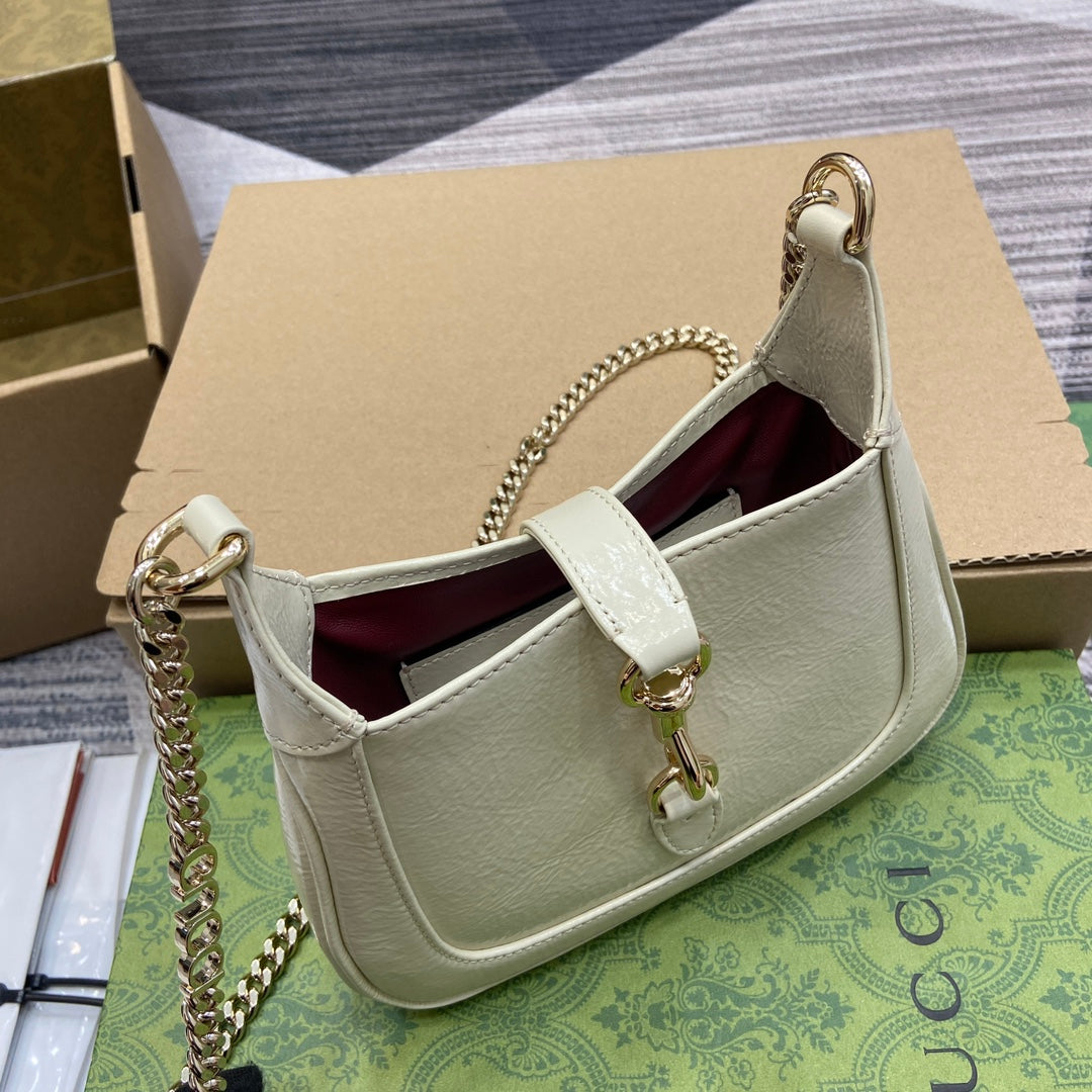 Luxury Gucci JACKIE NOTTE MINI BAG 19 IN WHITE CRACKED LACQUER CALFSKIN GOLD HARDWARE