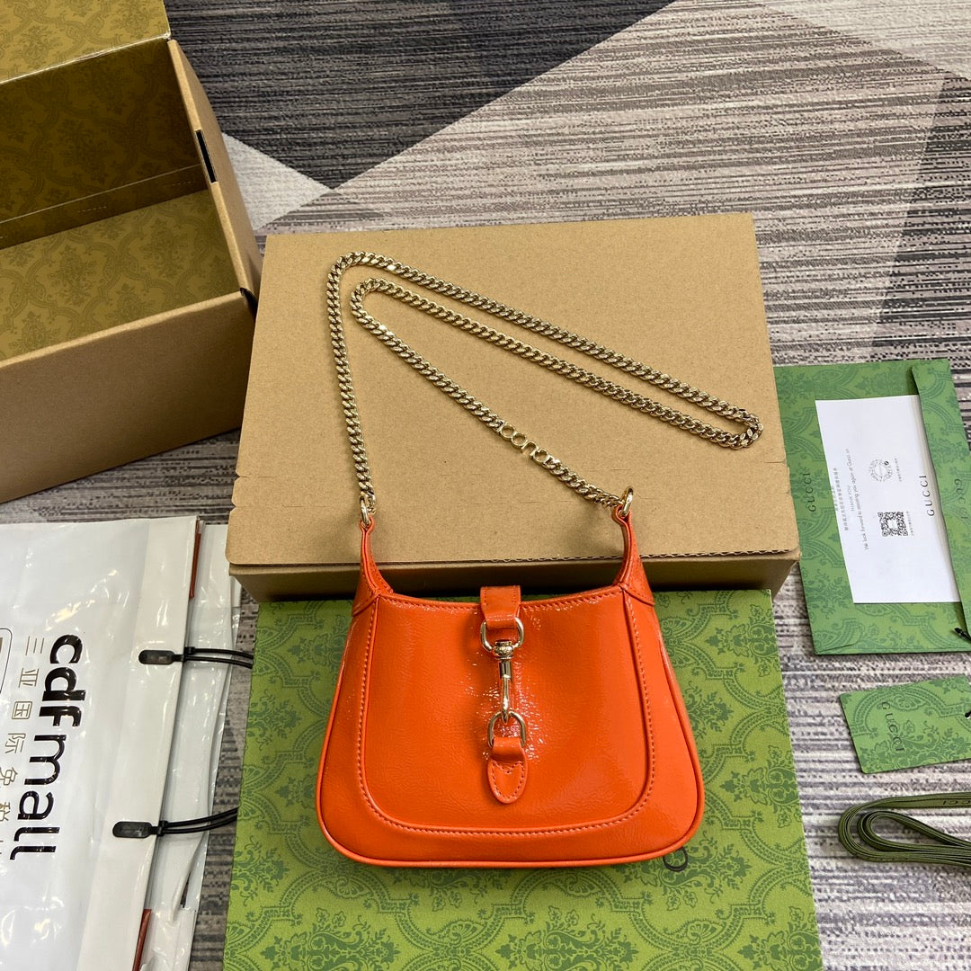 Luxury Gucci JACKIE NOTTE MINI BAG 19 IN ORANGE CRACKED LACQUER CALFSKIN GOLD HARDWARE