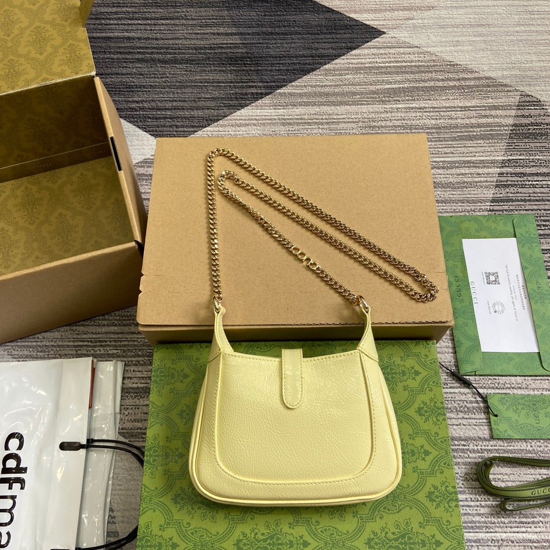 Luxury Gucci JACKIE NOTTE MINI BAG 19 IN LIGHT YELLOW CRACKED LACQUER CALFSKIN GOLD HARDWARE