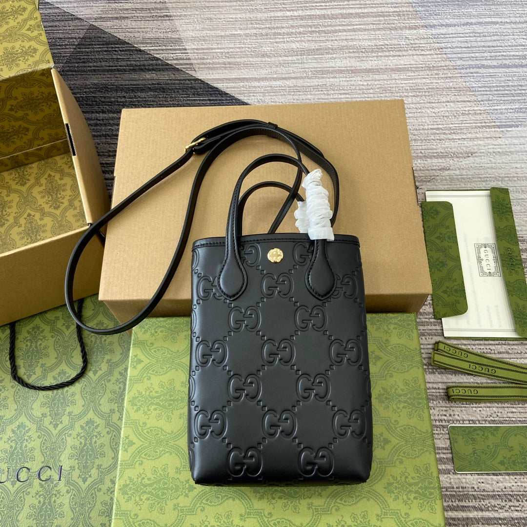 Luxury Gucci GG 20 SUPER MINI BAG WITH STRAP IN BLACK CALFSKIN