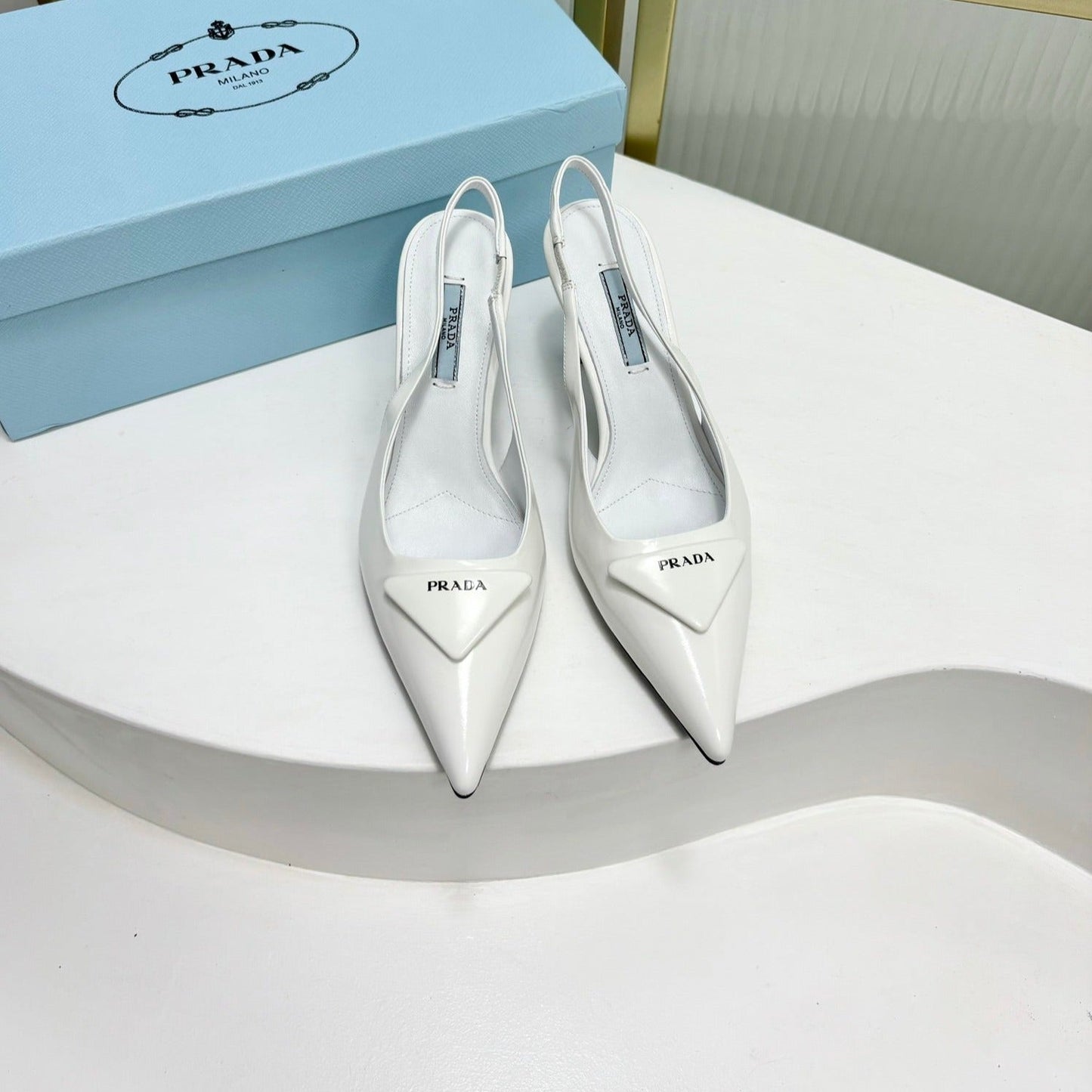 Luxury PradaPATENT LEATHER SLINGBACK PUMPS 75 WHITE