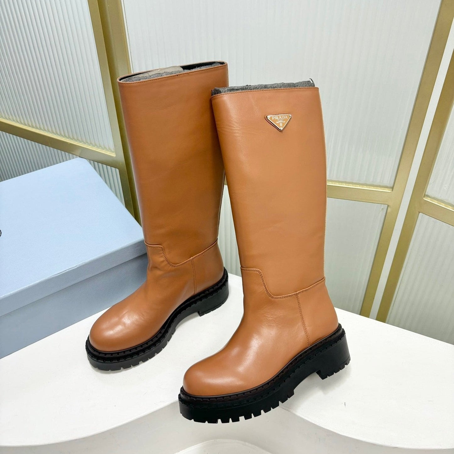 Luxury PradaKNEE BOOTS WITH TRIANGLE LOGO IN CAMEL CALFSKIN