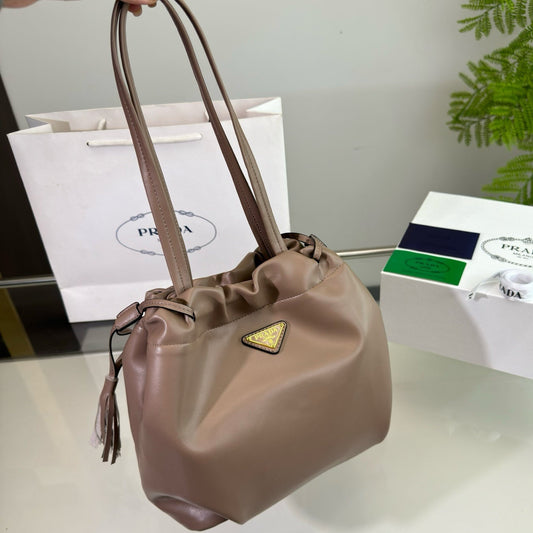 Luxury PradaDRAWSTRING BUCKET BAG 25 IN BROWN BEAR SOFT LAMBSKIN