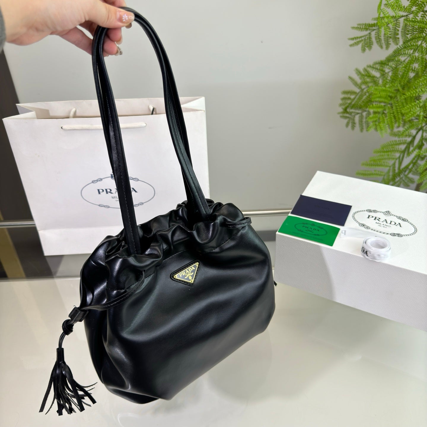 Luxury PradaDRAWSTRING BUCKET BAG 25 IN BLACK SOFT LAMBSKIN