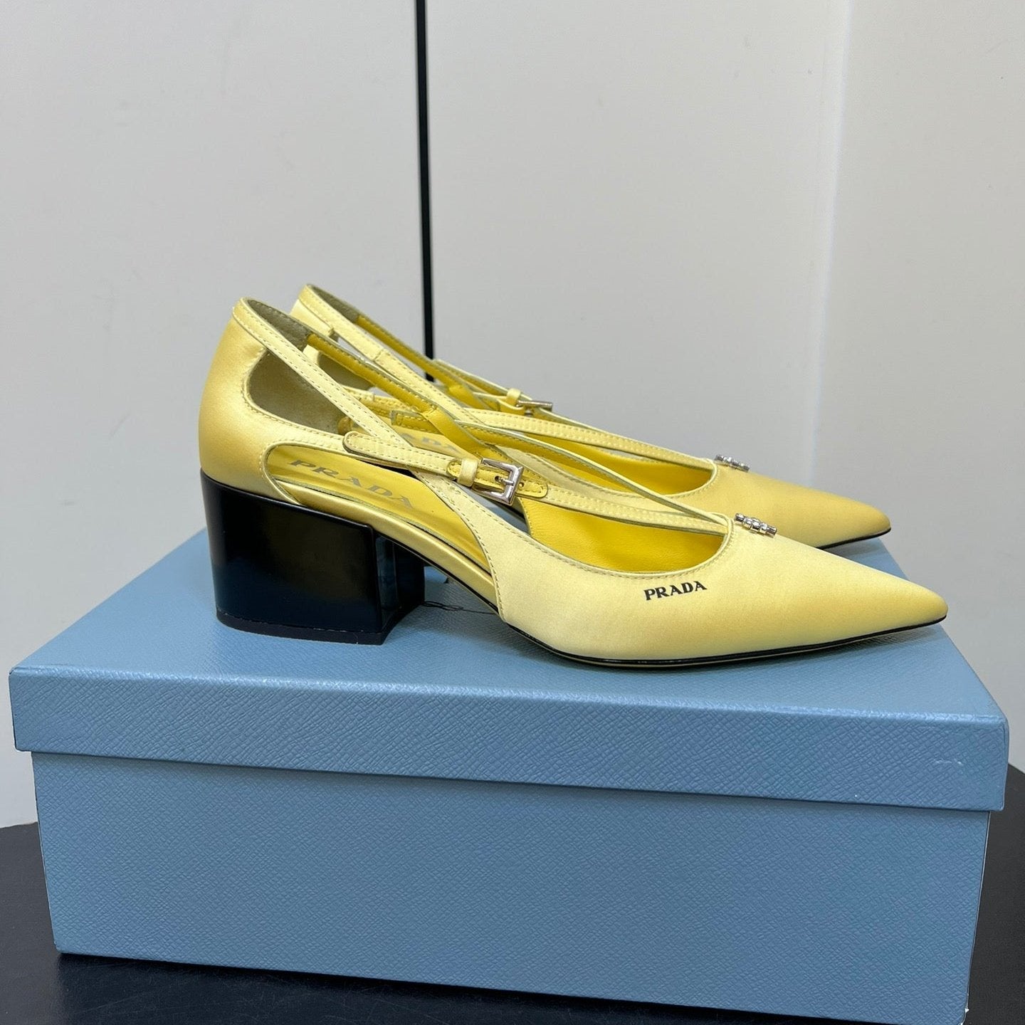 Luxury PradaCUT-OUT PUMPS WITH BEAD BUCKLE IN LIGHT YELLOW SATIN