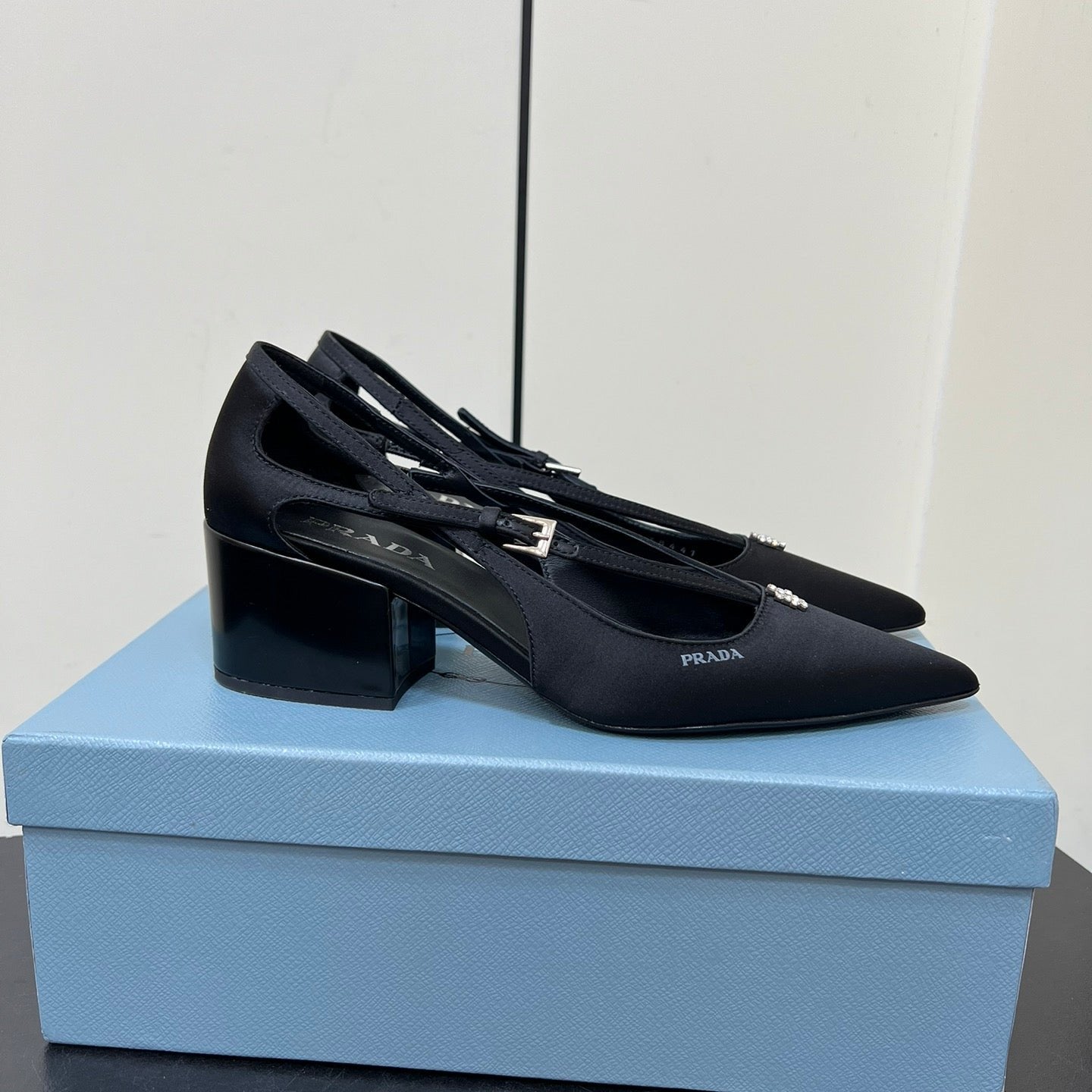 Luxury PradaCUT-OUT PUMPS WITH BEAD BUCKLE IN BLACK SATIN
