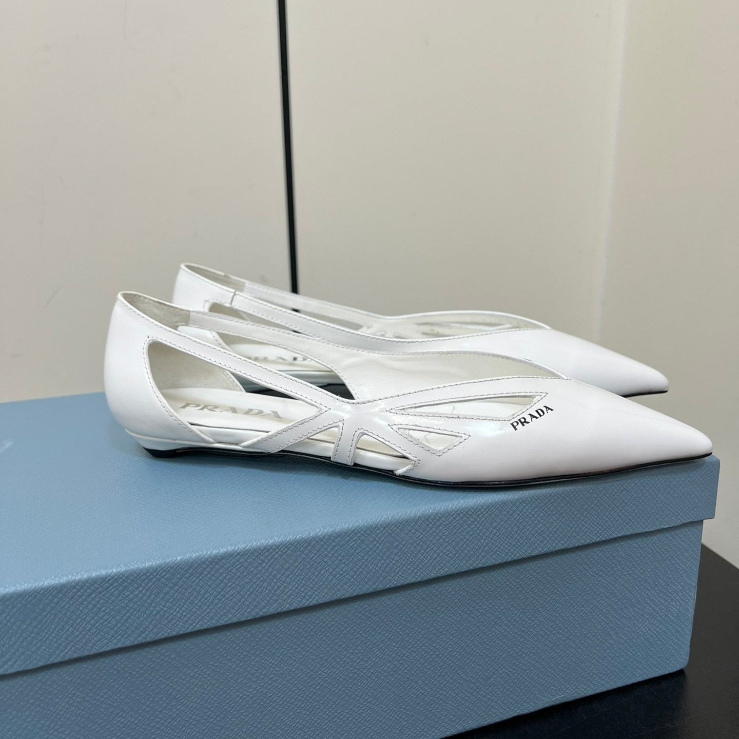 Luxury PradaBRUSHED CUT-OUT BALLERINA FLAT IN WHITE CALFSKIN