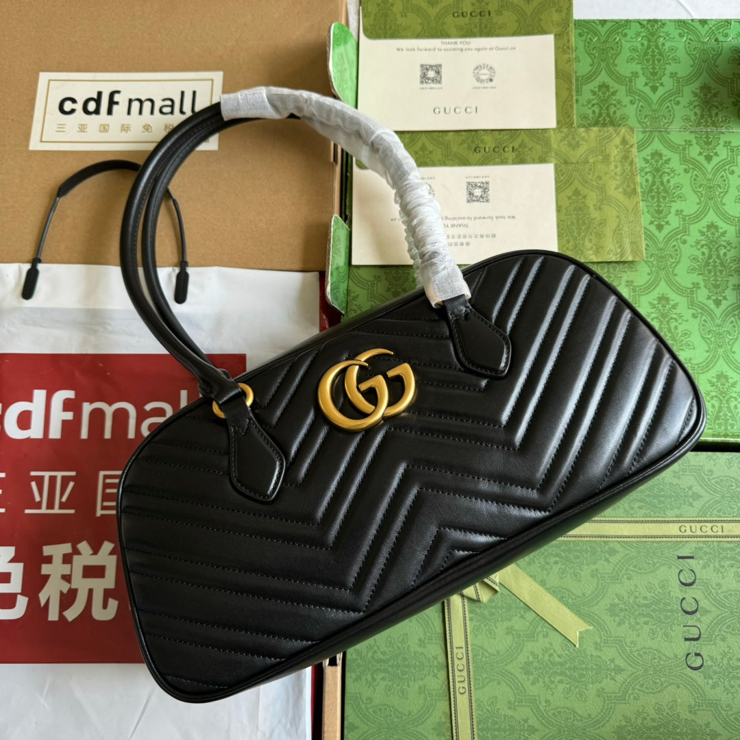 Luxury Gucci gg marmont medium top handle 35cm black calfskin gold hardware