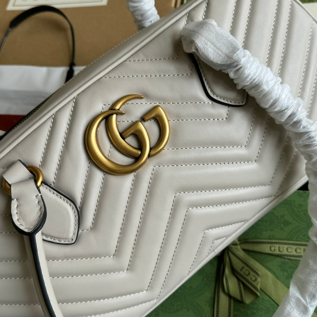 Luxury Gucci gg marmont medium top handle 35cm cream calfskin gold hardware