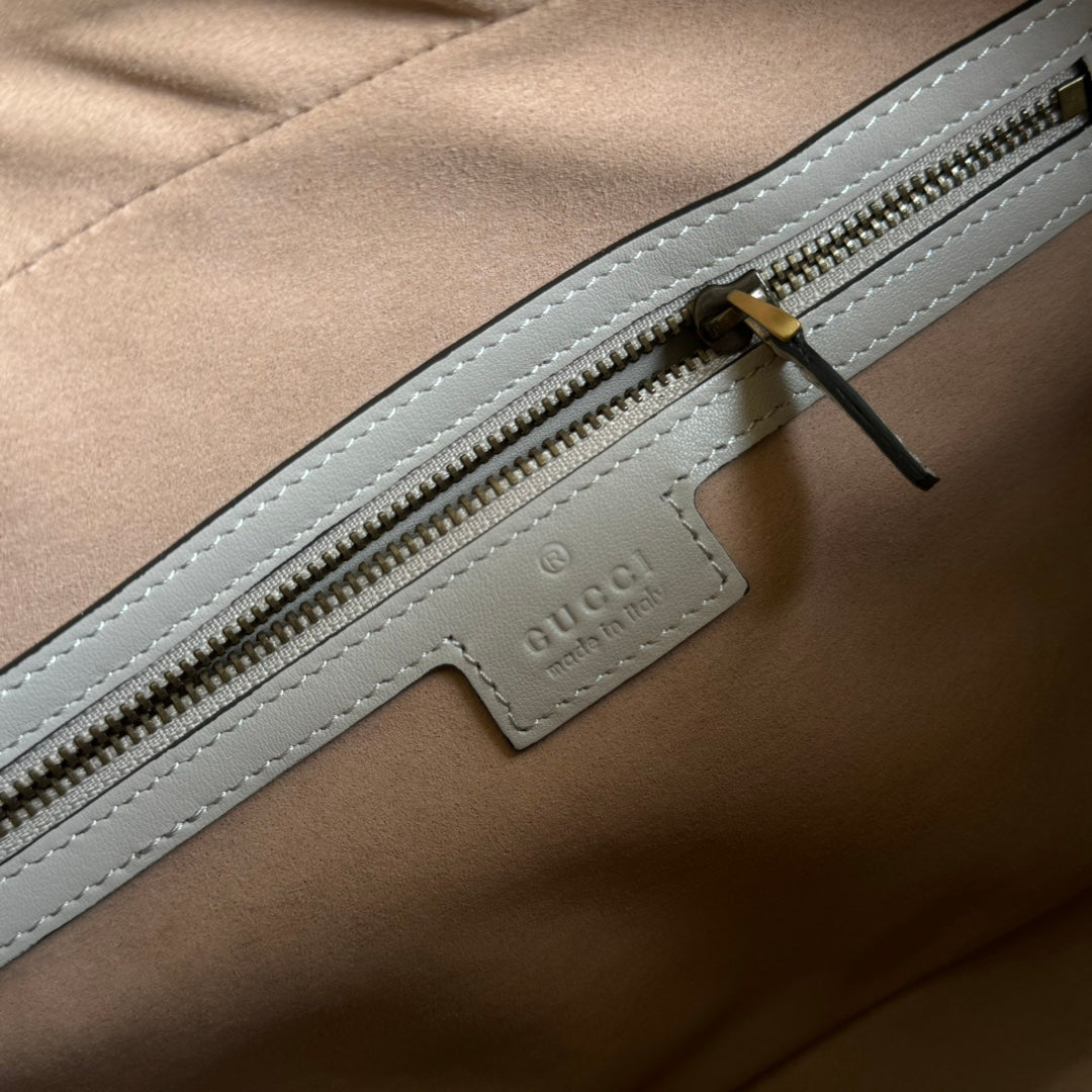 Luxury Gucci gg marmont medium top handle 35cm cream calfskin gold hardware