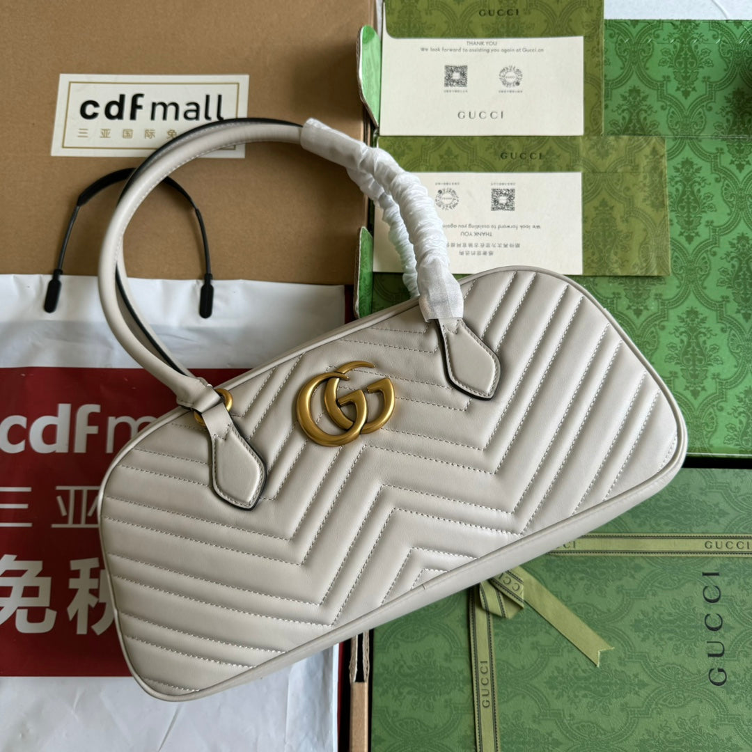 Luxury Gucci gg marmont medium top handle 35cm cream calfskin gold hardware