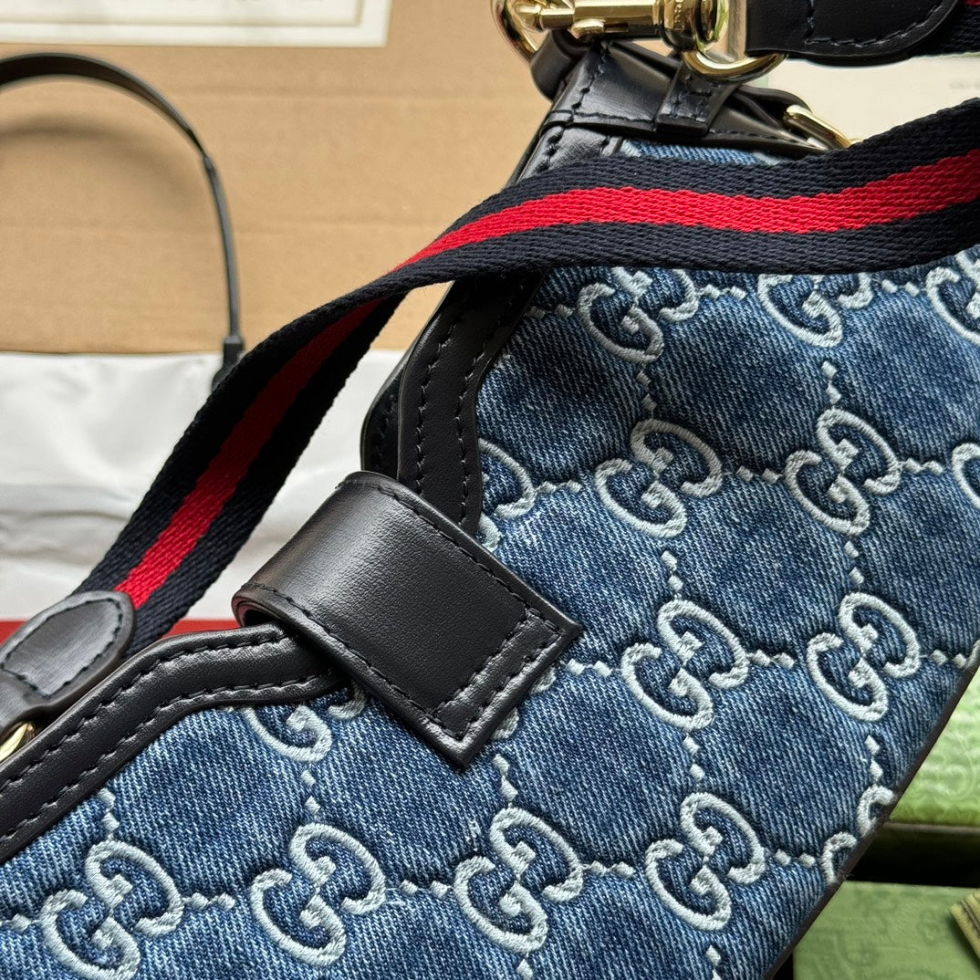 Luxury Gucci MOON SIDE SHOULDER BAG 24 IN BLUE EMBOSSED DENIM AND BLACK CALFSKIN TRIM GOLD HARDWARE