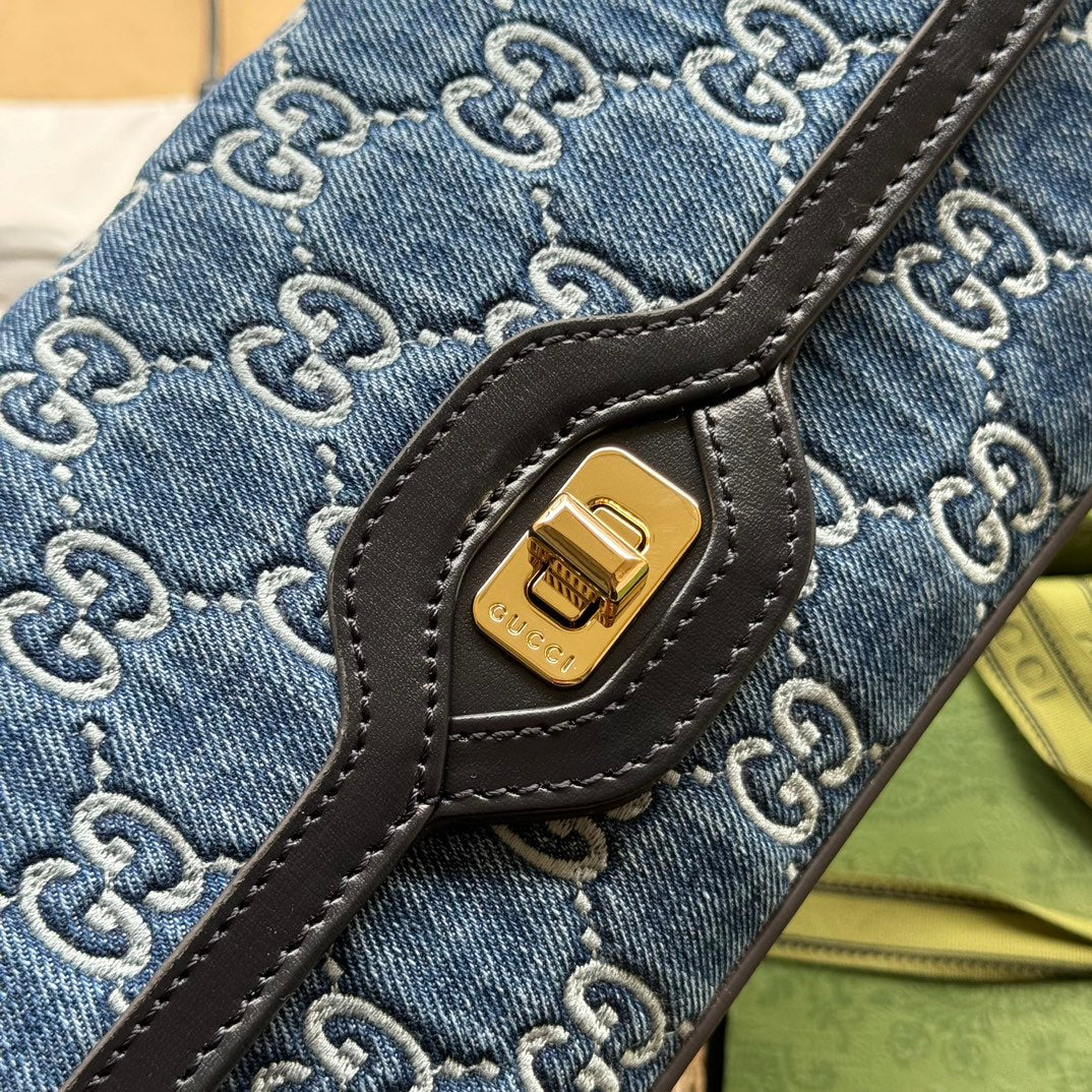 Luxury Gucci LUCE SMALL SHOULDER BAG 27 IN BLUE EMBOSSED DENIM AND BLACK CALFSKIN TRIM GOLD HARDWARE