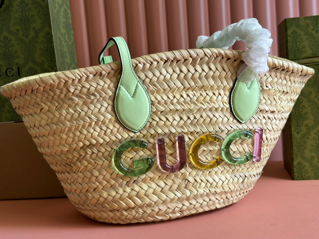 Luxury Gucci SMALL TOTE BAG 26 WITH LOGO IN NATURAL-COLORED STRAW AND LIGHT GREEN CALFSKIN HANDLE