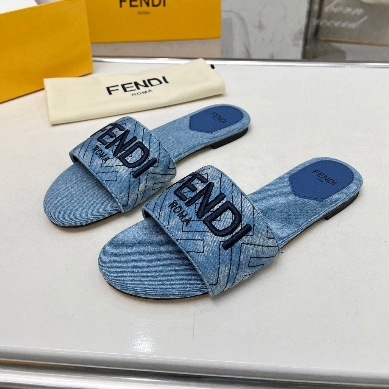 Luxury FendiFF 5 BLUE DENIM CANVAS SLIDE