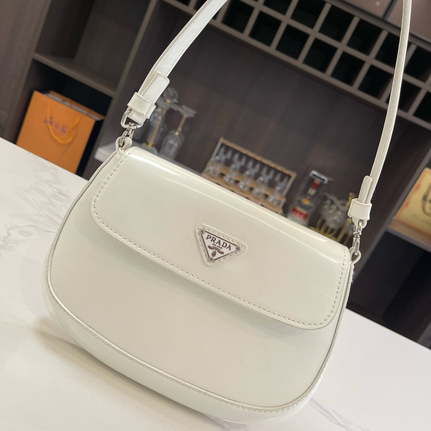Luxury Prada25 CLEO FLAP SHOULDER BAG IN WHITE BRUSHED LEATHER