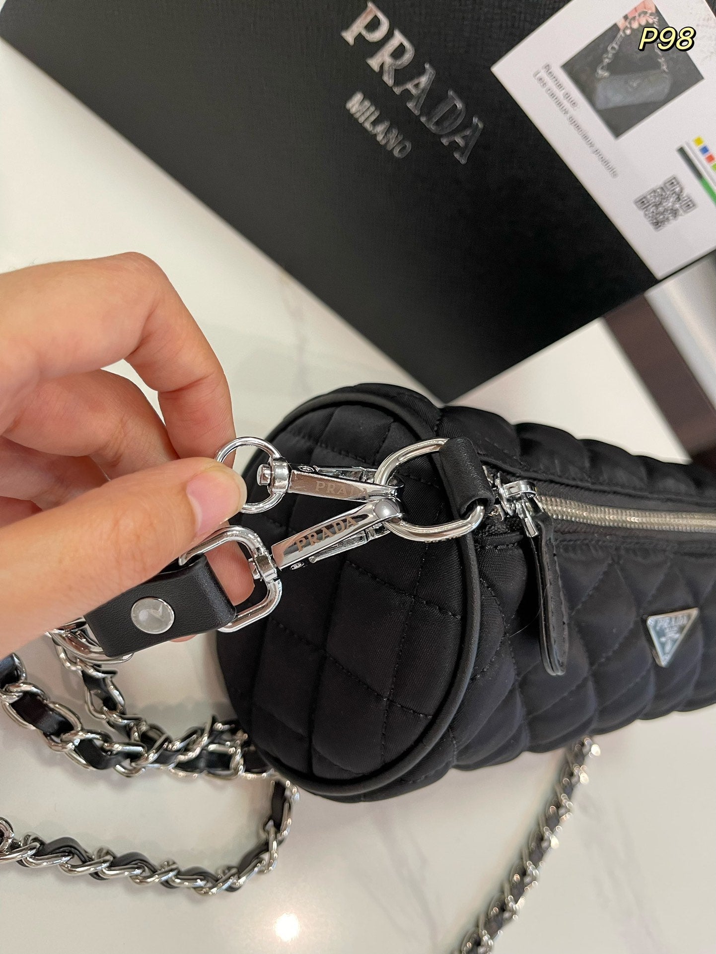 Luxury PradaCYLINDRICAL 20 BAG IN BLACK RE-NYLON SILVER HARDWARE