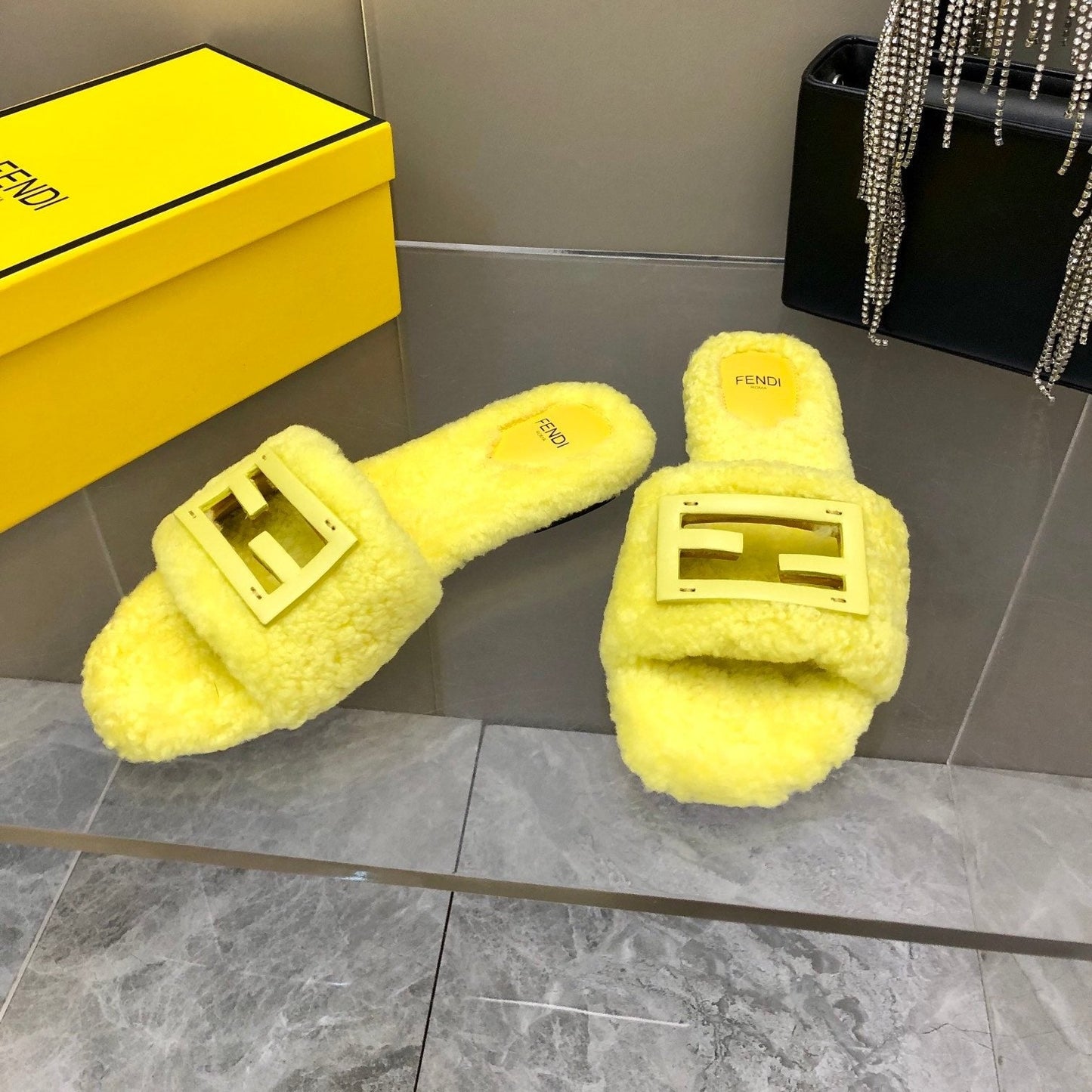 Luxury FendiLuxury FendiBAGUETTE SLIDE SLIPPERS IN BRIGHT YELLOW WOOL