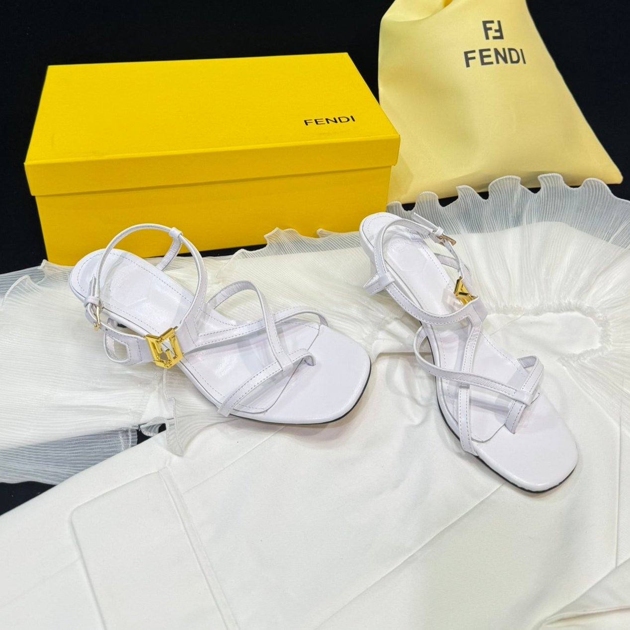 Luxury FendiLuxury FendiFFOLD MEDIUM-HEELED 55 MM SANDALS IN WHITE LAMBSKIN WITH GOLD HARDWARE