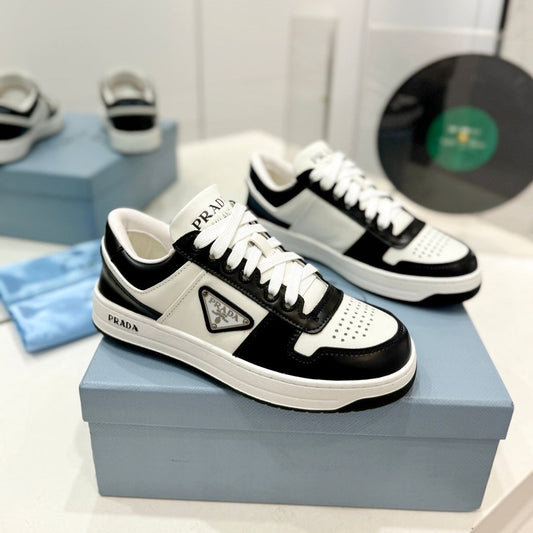 Luxury PradaDOWNTOWN PERFORATED SNEAKERS BLACK AND WHITE CALFSKIN