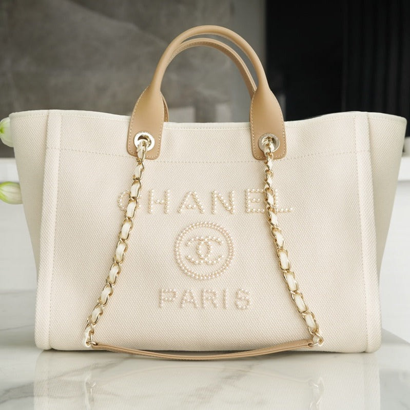 Luxury Chanel LARGE TOTE 39 LIGHT BEIGE CANVAS PEARL LOGO