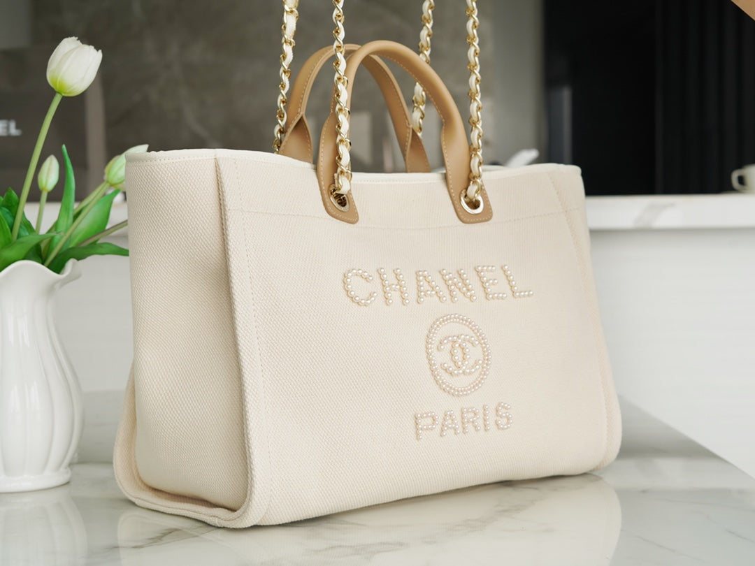 Luxury Chanel LARGE TOTE 39 LIGHT BEIGE CANVAS PEARL LOGO