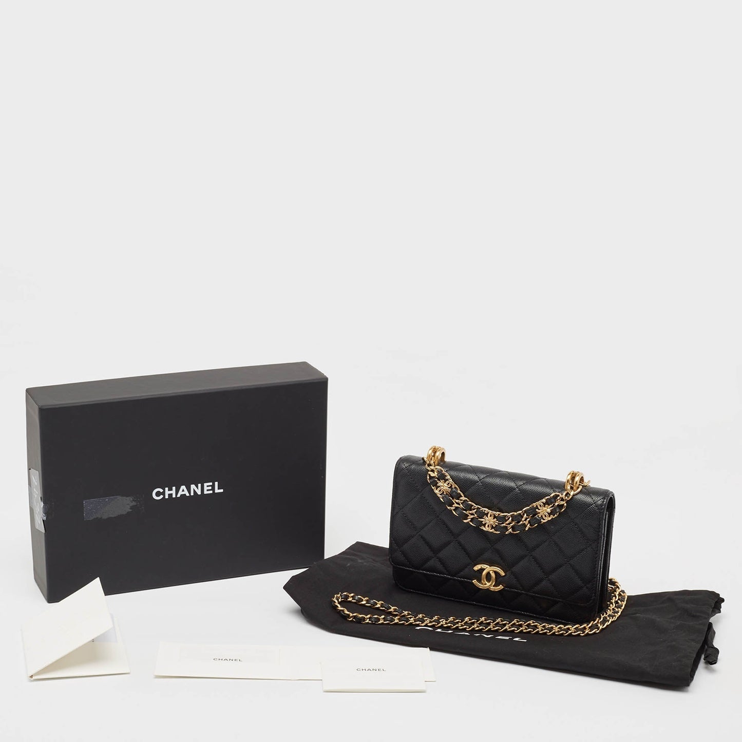 CHANEL Black Quilted Caviar Leather Coco First Wallet on Chain