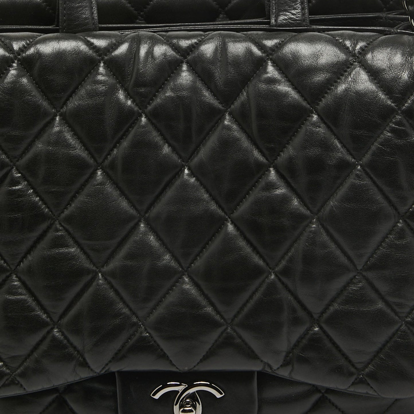 CHANEL Black Quilted Leather Maxi 3 Flap Bag