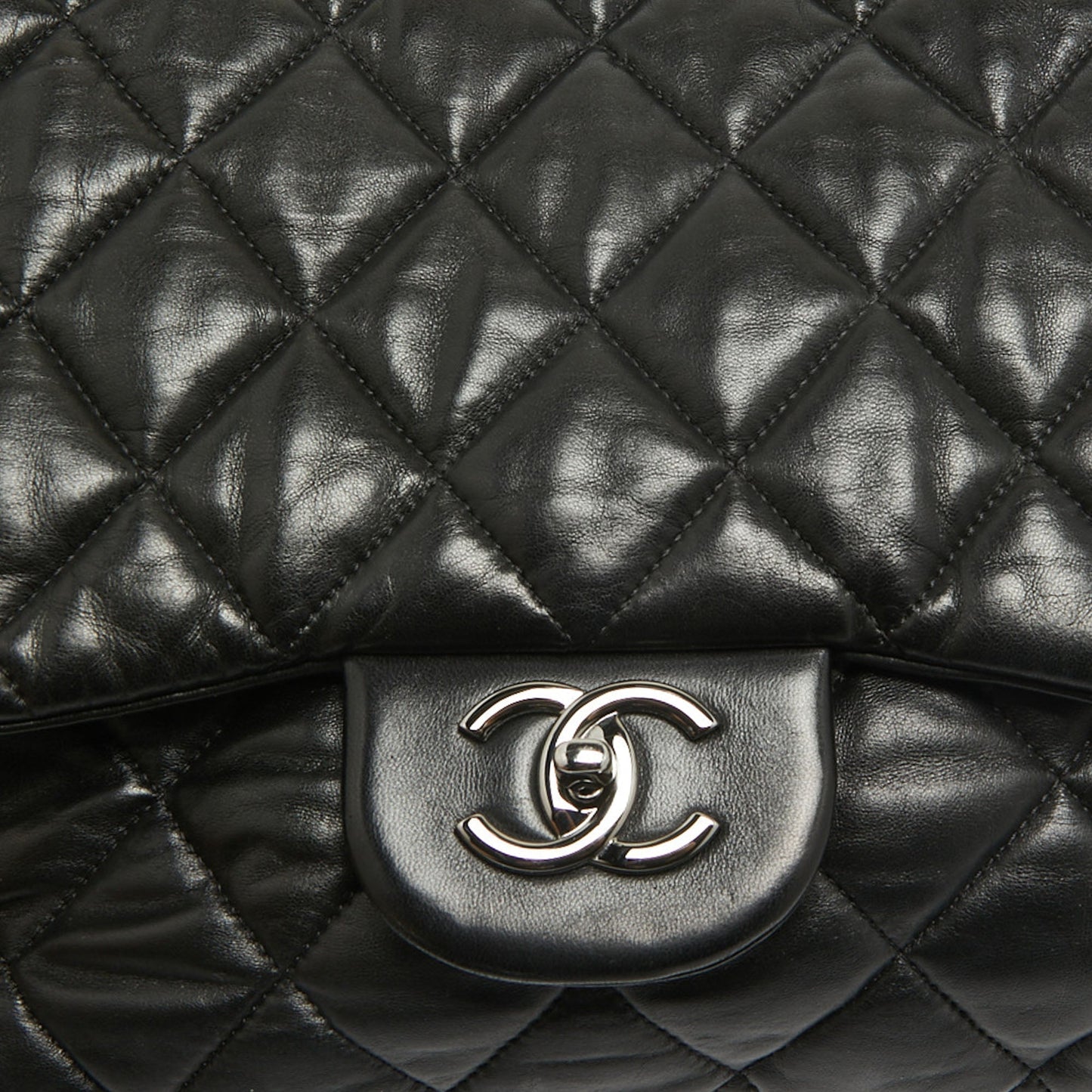 CHANEL Black Quilted Leather Maxi 3 Flap Bag