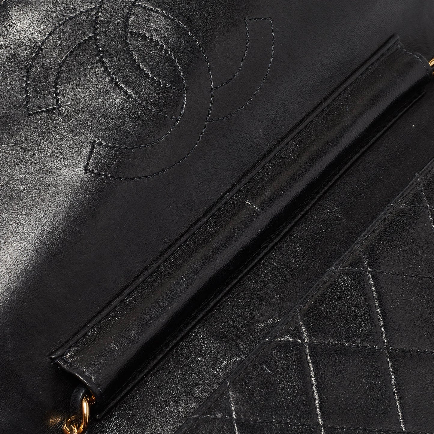 CHANEL Black Quilted Leather CC Flap Bag