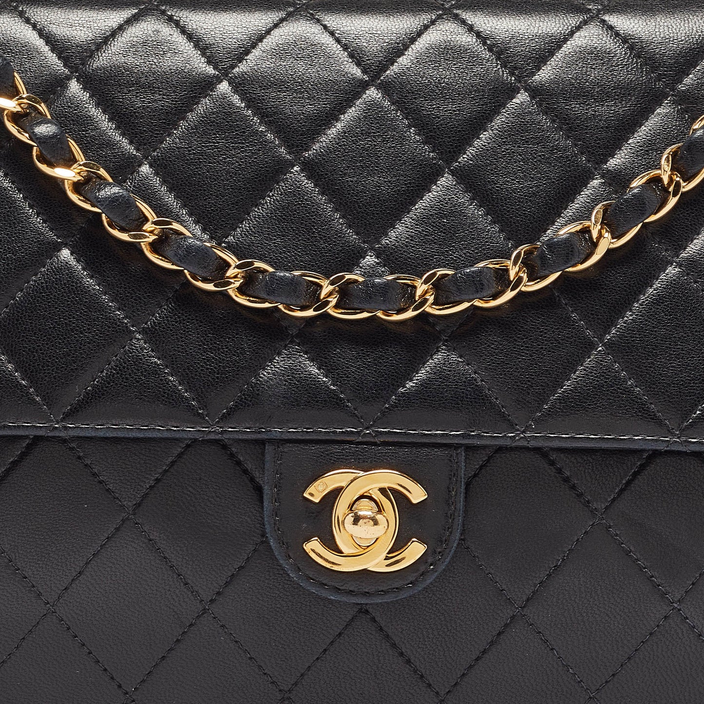 CHANEL Black Quilted Leather CC Flap Bag