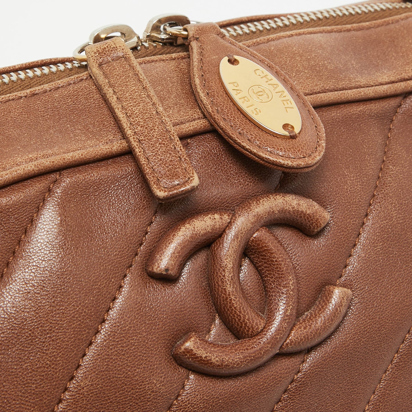CHANEL Brown Diagonal Quilted Leather CC Covered Signature Flap Bag