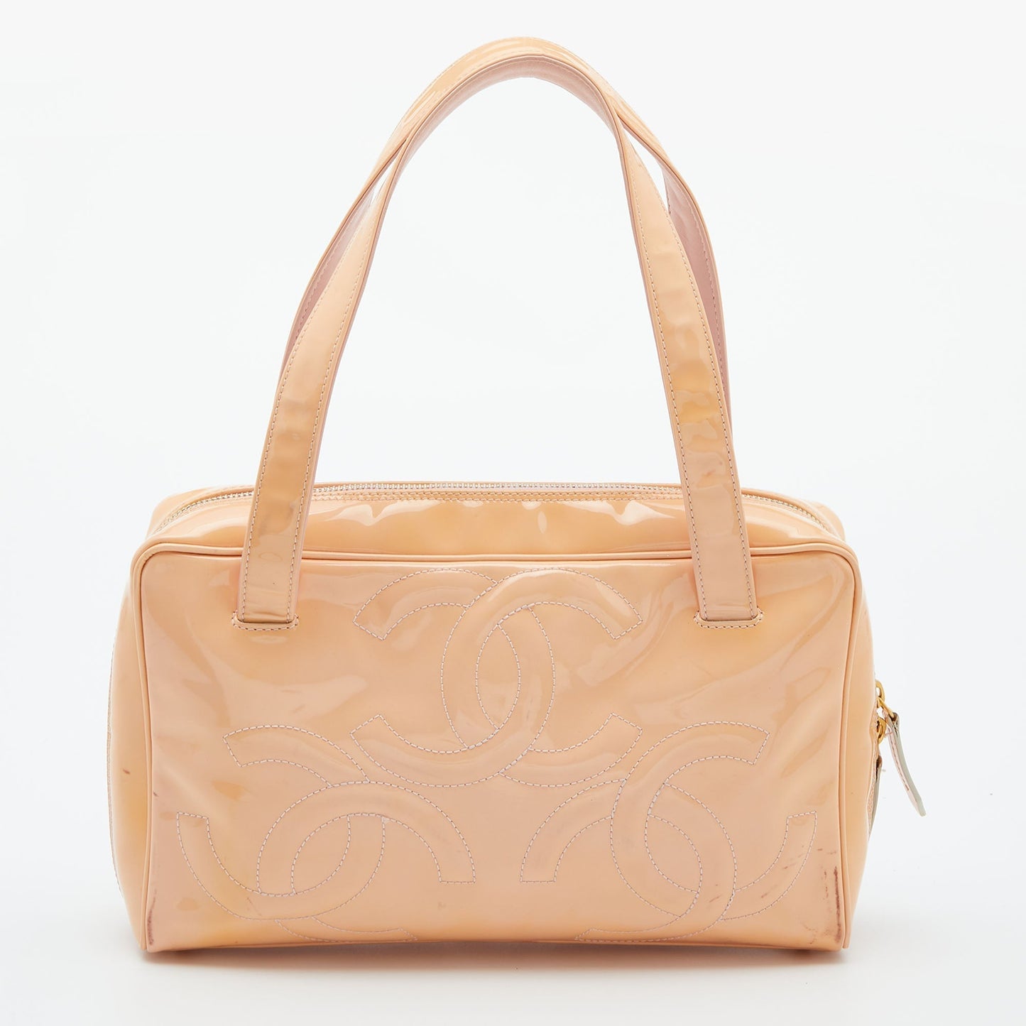 Luxury Chanel Peach Patent Leather Triple CC Bag