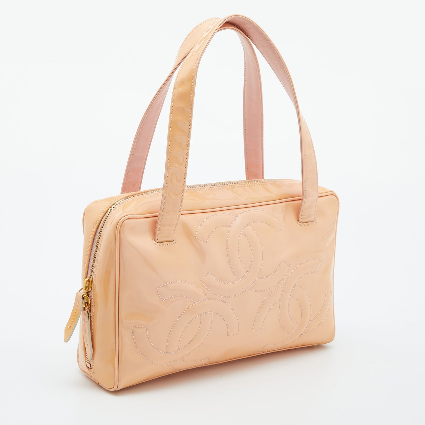 Luxury Chanel Peach Patent Leather Triple CC Bag