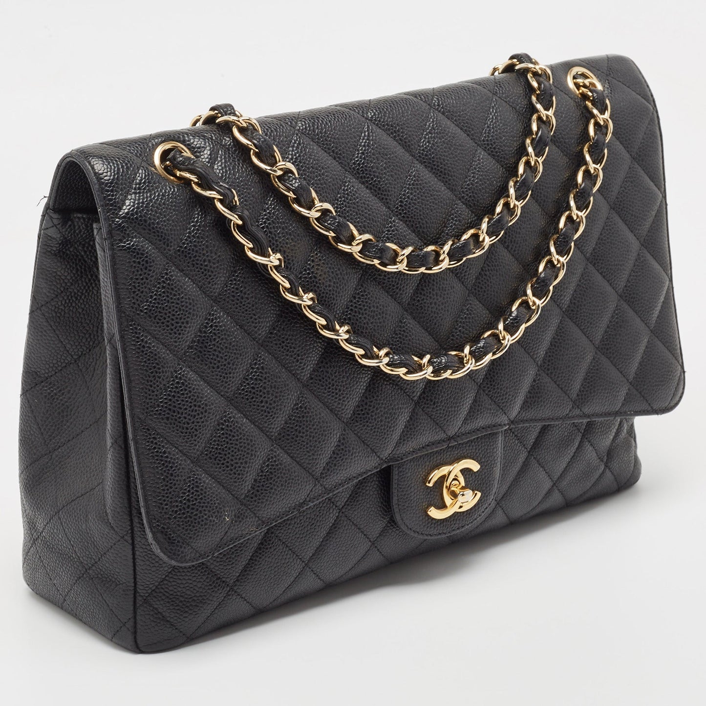 CHANEL Black Quilted Caviar Leather Maxi Classic Single Flap Bag