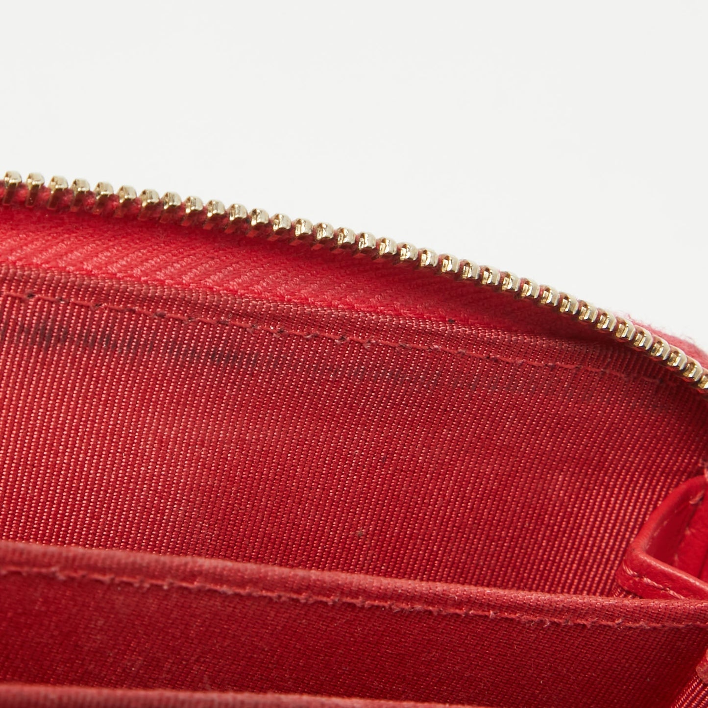 CHANEL Red Quilted Caviar Leather Zip Around Coin Purse