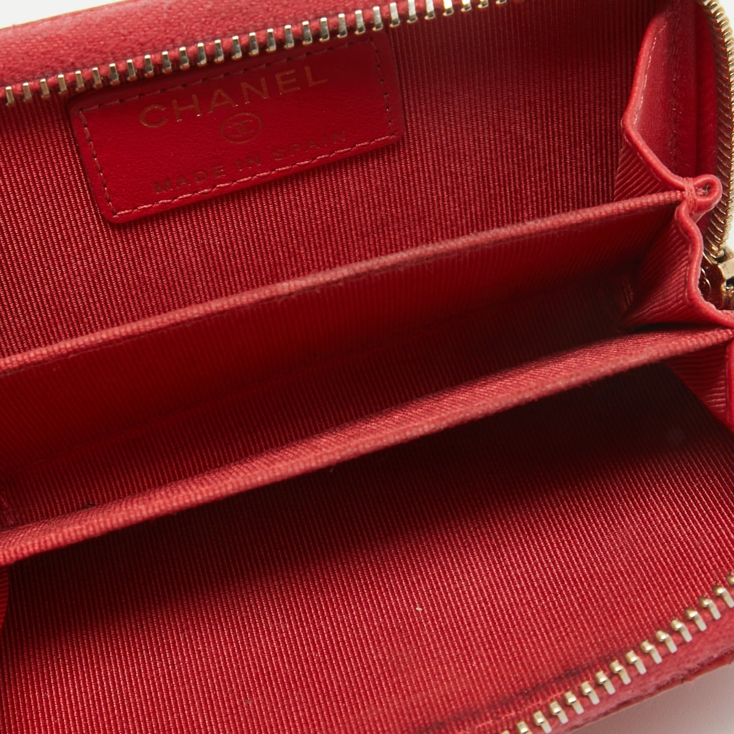 CHANEL Red Quilted Caviar Leather Zip Around Coin Purse
