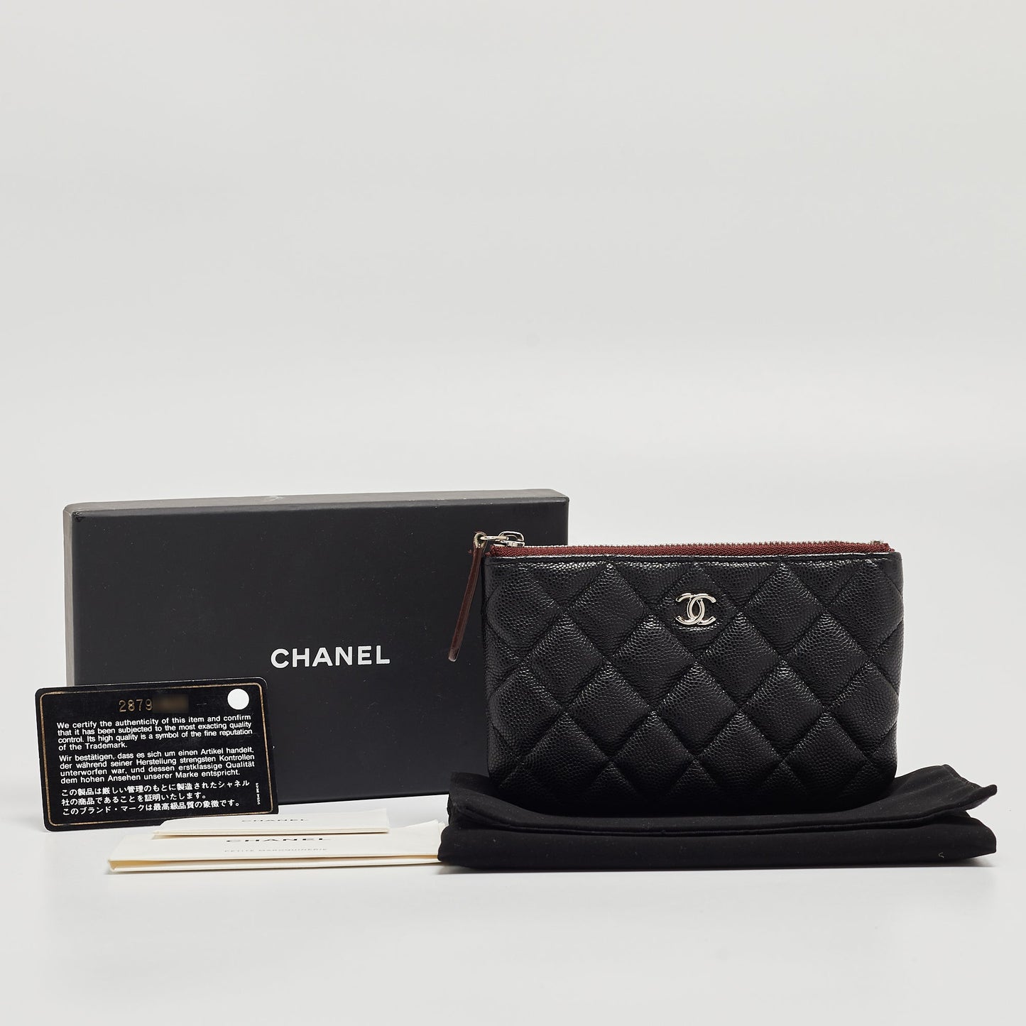 CHANEL Black Quilted Caviar Leather Mini O-Case Zip Pouch