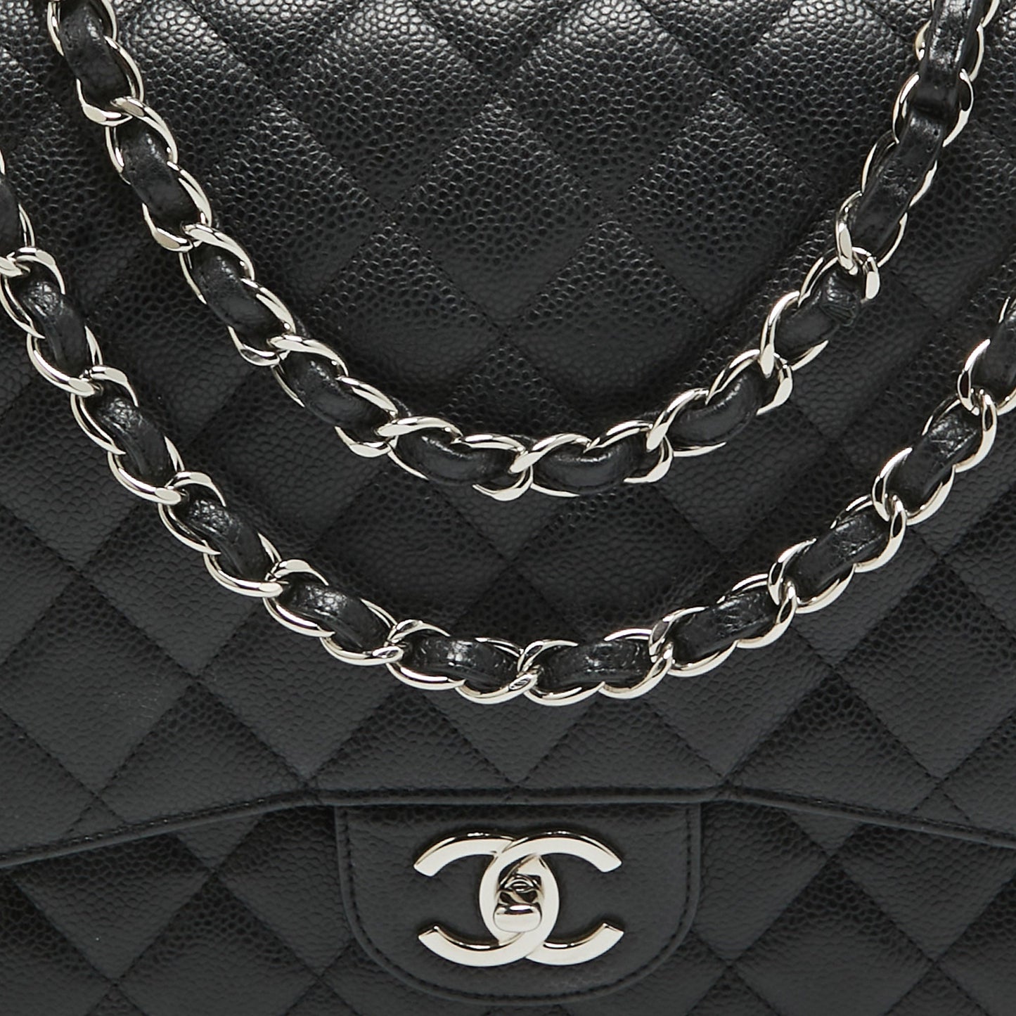 CHANEL Black Quilted Caviar Leather Maxi Classic Double Flap Bag