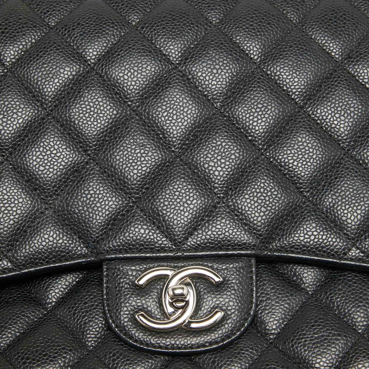 CHANEL Black Quilted Caviar Leather Maxi Classic Double Flap Bag