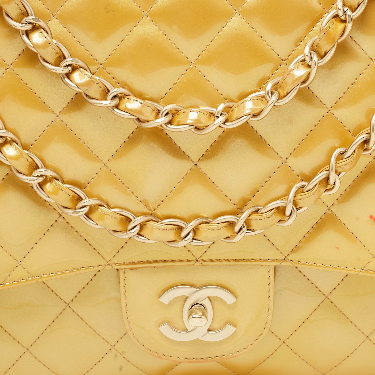 CHANEL Gold Quilted Patent Leather Maxi Classic Single Flap Bag