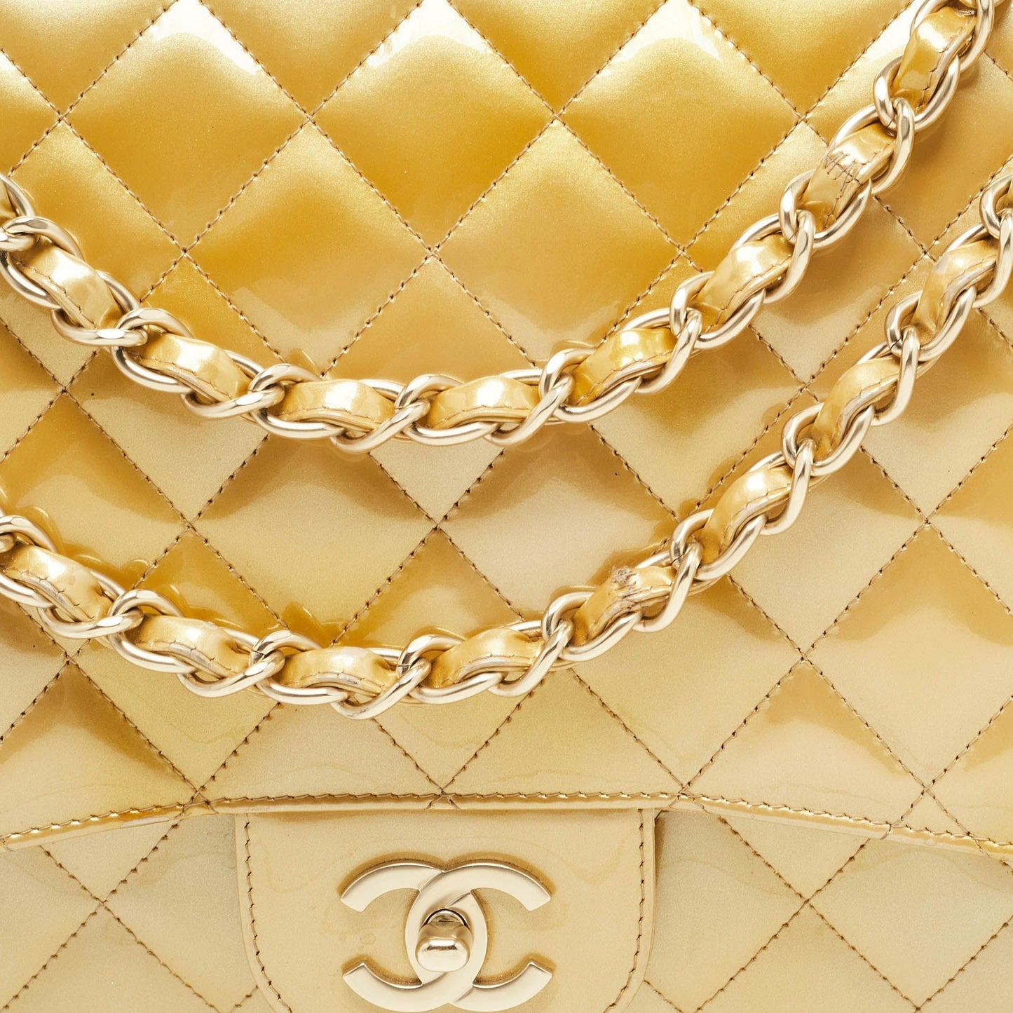 CHANEL Gold Quilted Patent Leather Maxi Classic Single Flap Bag