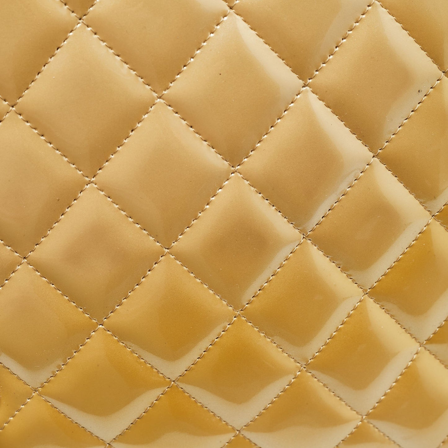 CHANEL Gold Quilted Patent Leather Maxi Classic Single Flap Bag