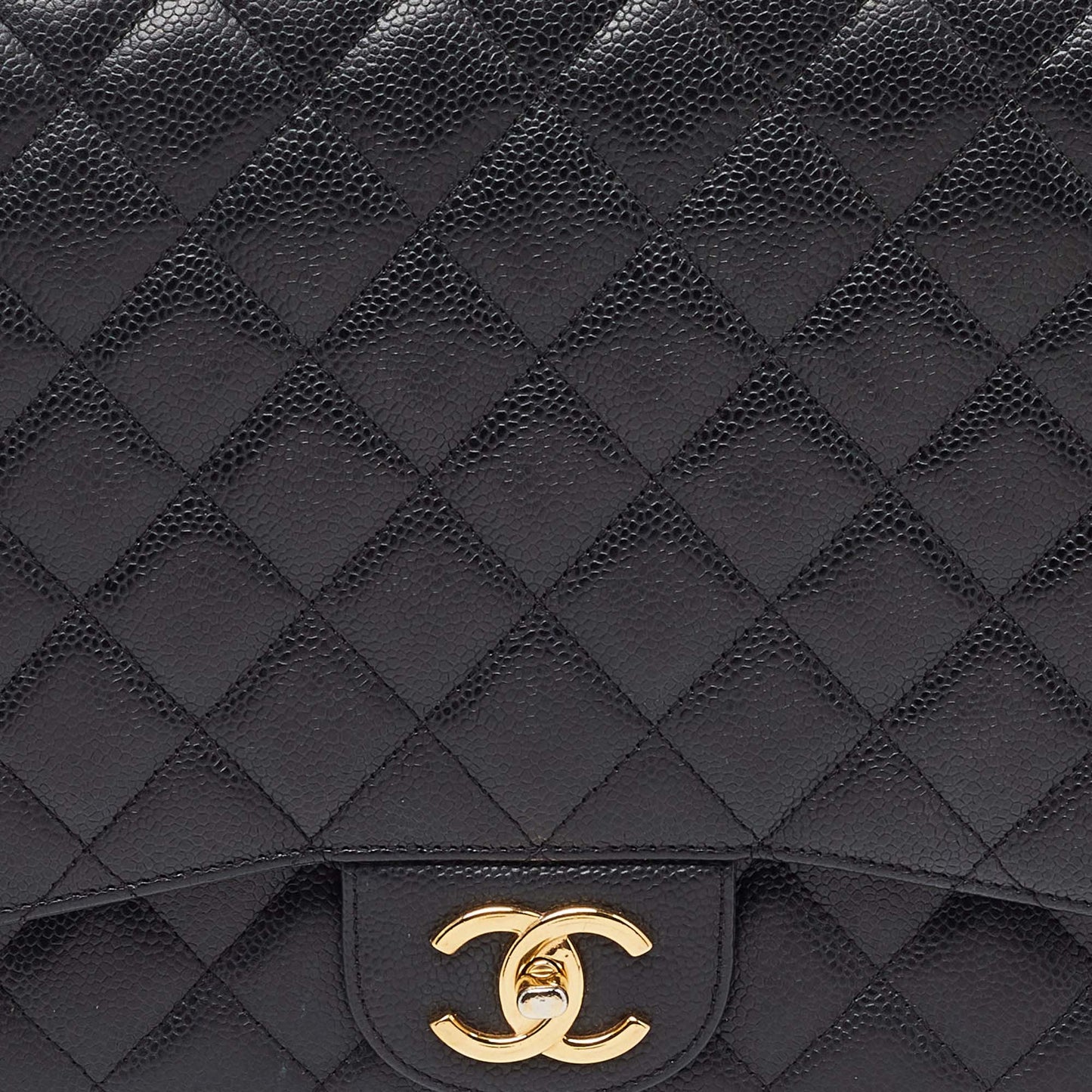 CHANEL Black Quilted Caviar Leather Maxi Classic Double Flap Bag