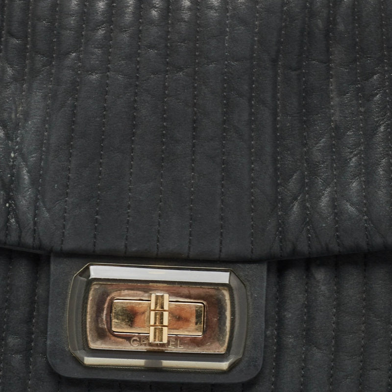 CHANEL Black Vertical Quilt Iridescent Leather Mademoiselle Flap Shoulder Bag