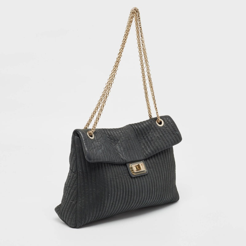 CHANEL Black Vertical Quilt Iridescent Leather Mademoiselle Flap Shoulder Bag